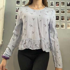 Long sleeve blue and white blouse with flowers